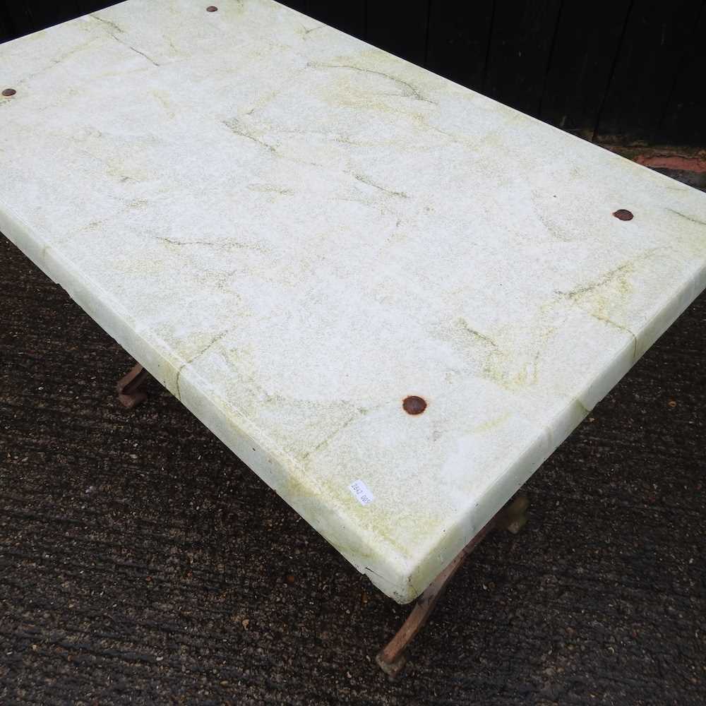 A garden table, on a metal base 99w x 60d x 72h cm Overall condition is solid and usable. The top is - Bild 2 aus 2