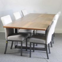A modern extending dining table on a metal base, together with six upholstered chairs 280w x 100d