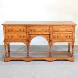 An 18th century style oak dresser base, with a pot board below 153w x 46d x 82h cm Overall condition