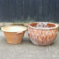 A glazed garden pot, 52cm wide, together with another smaller (2)