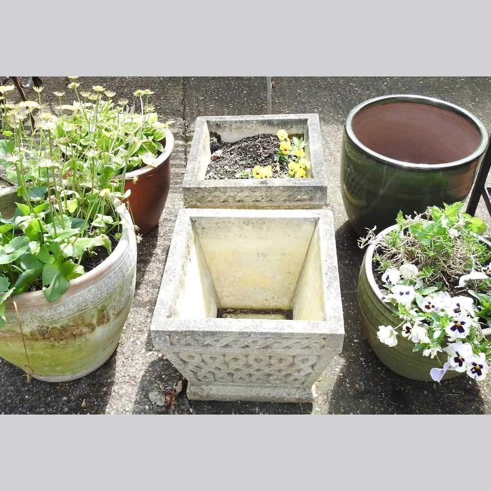 A pair of cast stone garden pots, 40cm wide, together with four various garden pots (6)
