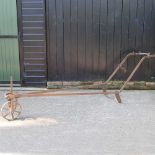 A 19th century iron hand plough, 300cm long