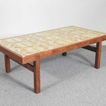 A 1960's Danish teak coffee table, with a tiled top 126w x 66d x 43h cm