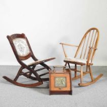 An Ercol style spindle back armchair, together with an early 20th century folding chair and a