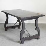 A Spanish dining table, 20th century, on a splayed base with iron supports 151w x 76d x 76h cm