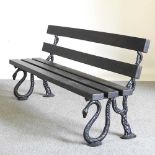 A Coalbrookdale style serpent cast iron garden bench, with a slatted wooden seat, 160cm wide