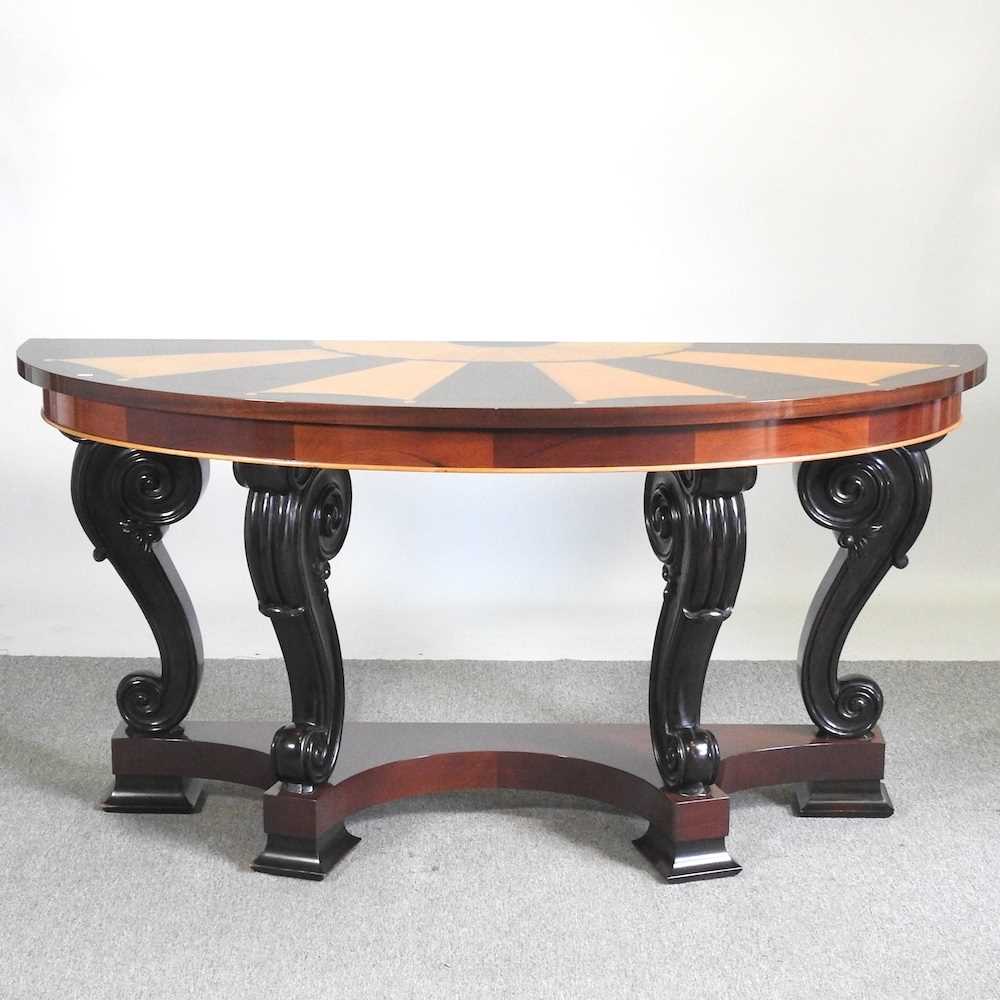 A continental parquetry console table, 20th century, with a half round radially veneered top, on