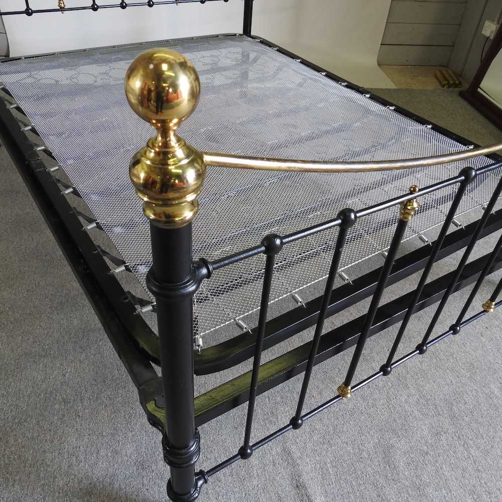 A Victorian style brass and iron double bedstead, with a sprung base 155w x 212l cm - Image 3 of 3