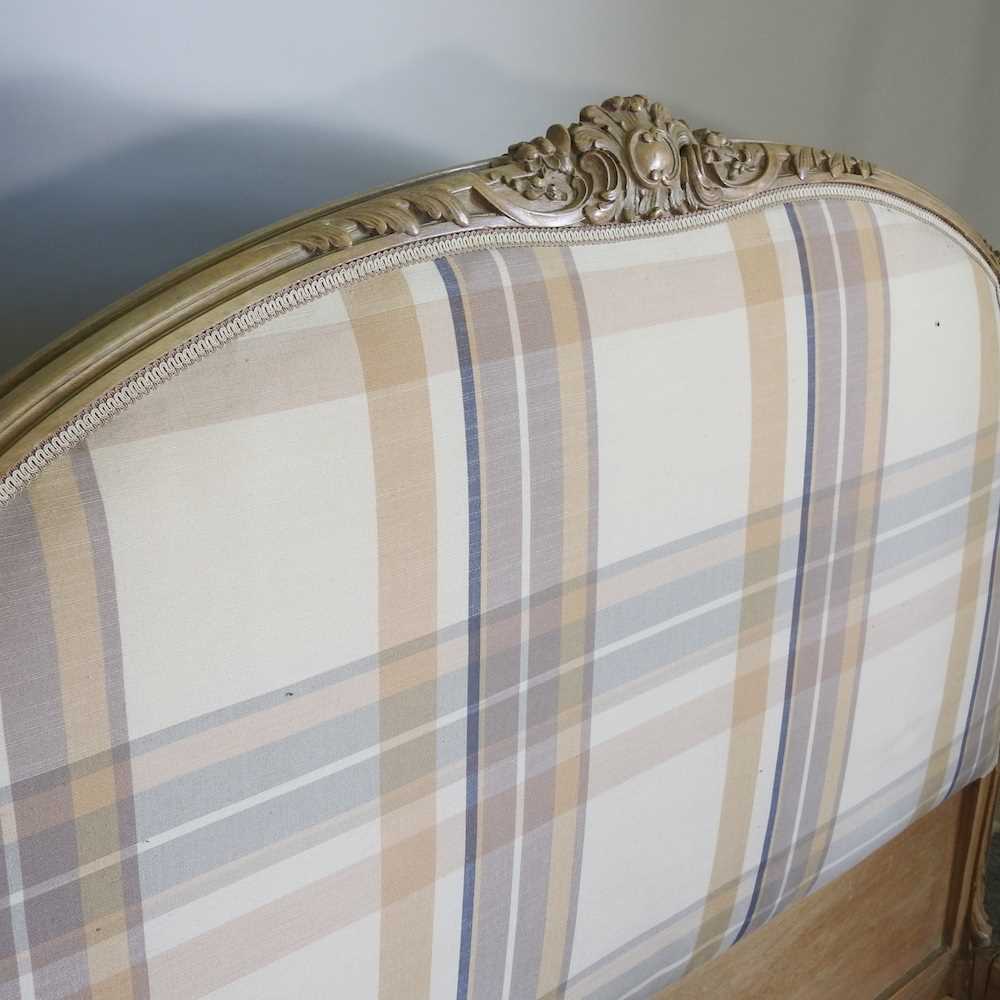 A later 20th century French limed and cream check upholstered double bedstead, with a slatted wooden - Image 5 of 5