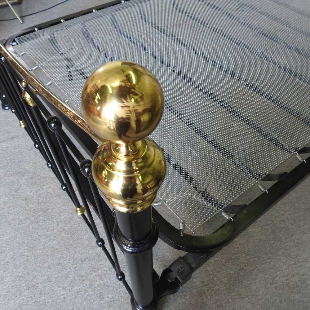 A Victorian style brass and iron double bedstead, with a sprung base 155w x 212l cm - Image 2 of 3