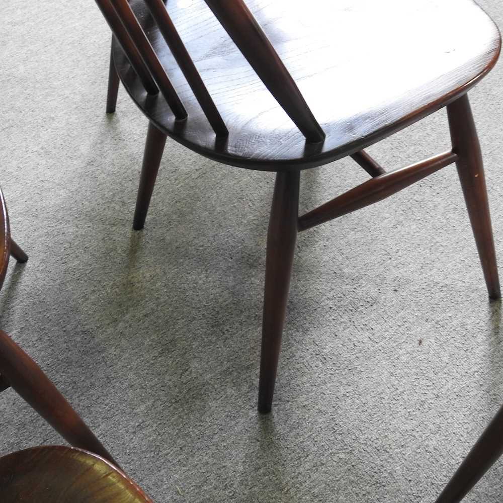 A set of six Ercol dark elm hoop back dining chairs, to include a pair of carvers (6) - Image 6 of 7