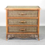 A wicker chest of three drawers 97w x 51d x 91h cm