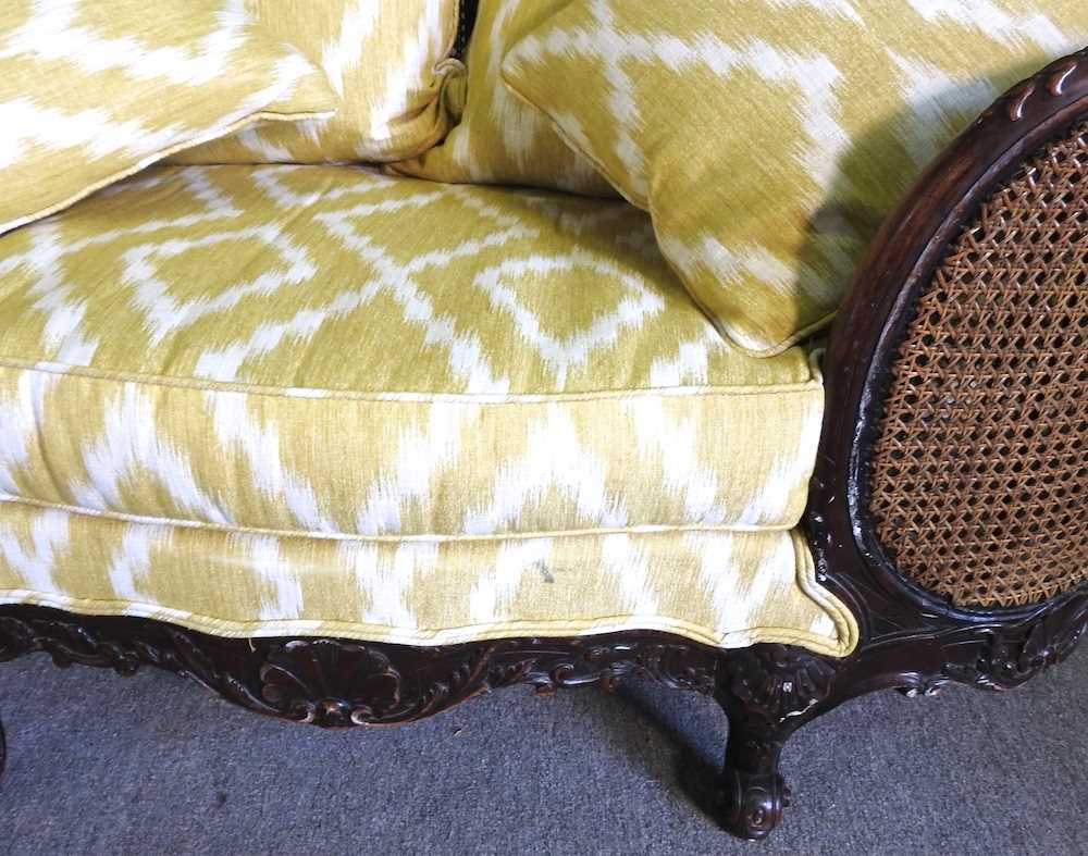 An early 20th century double cane bergere sofa, with yellow upholstery by Merryweather 186w x 72d - Image 7 of 7