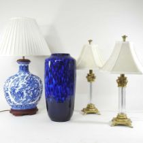 A pair of modern gilt column table lamps and shades, another lamp and a vase (4)