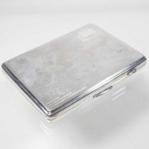 An early 20th century silver cigarette case, with engine turned decoration, Birmingham 1934, 183g,