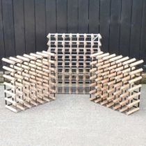 A wooden and metal wine rack, 71cm, together with two smaller (3) 71w x 82h cm