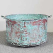 A large twin handled copper, of circular shape 82 w x 44h cm