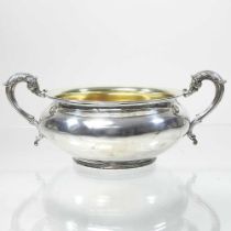 A William IV silver sucrier, of circular twin handled shape, London 1832, 262g, 20cm wide overall