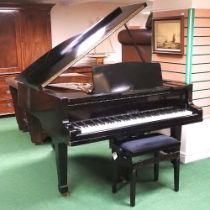 A mid 20th century German Bluthner baby grand piano, in an ebonised case, the frame stamped