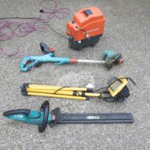 An electric garden strimmer, together with a hedge trimmer and tools (4)