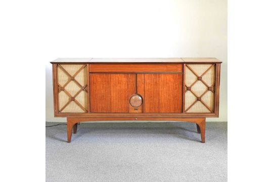 A 1960's Sierra radiogram, in a wooden case, fitted with a clock, 166cm wide - Image 1 of 7