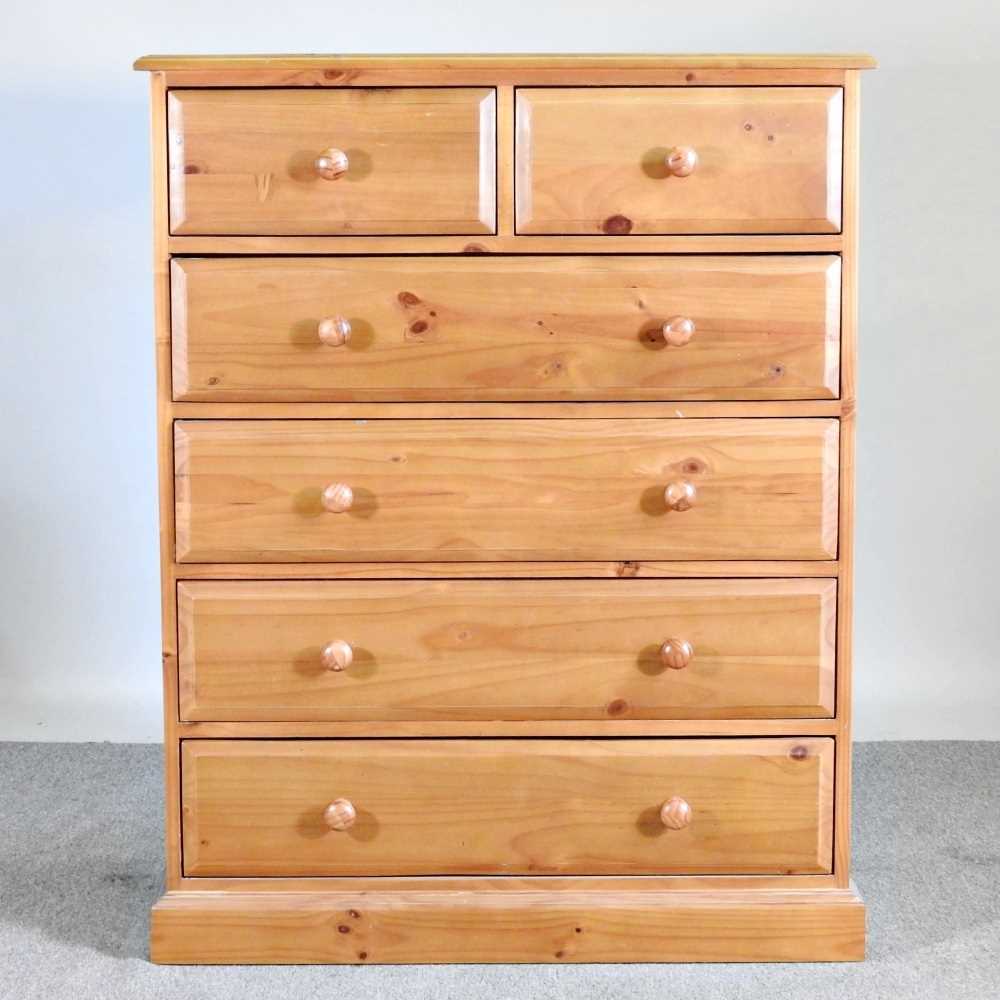 A modern pine chest, containing two short over four long drawers 90w x 43d x 108h cm