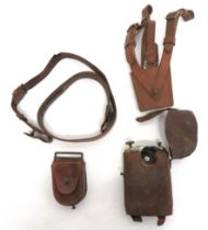 Four Items Of Officer Equipment consisting Officer's ""Orilux"" bullseye torch.  Complete in leather