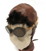 WW1/1920's Flying/Driving Helmet brown leather, multi pad helmet.  Fold up, fur covered, front peak.