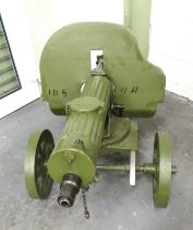 Deactivated Maxim M1910 Russian Heavy MG And Carriage 7.62 mm, 29 inch barrel.  Green painted,