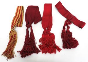 Four Various Dress Sashes And Belt consisting scarlet dress belt with hidden buckle.  Two hanging