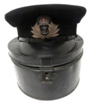 WW2 Royal Navy Officer's Cap Complete In Transit Tin black crown and body. Black patent peak and