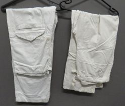 Two Pairs of British WW2 Camouflaged Snow Suit Over Trousers  white cotton over trousers.  Left