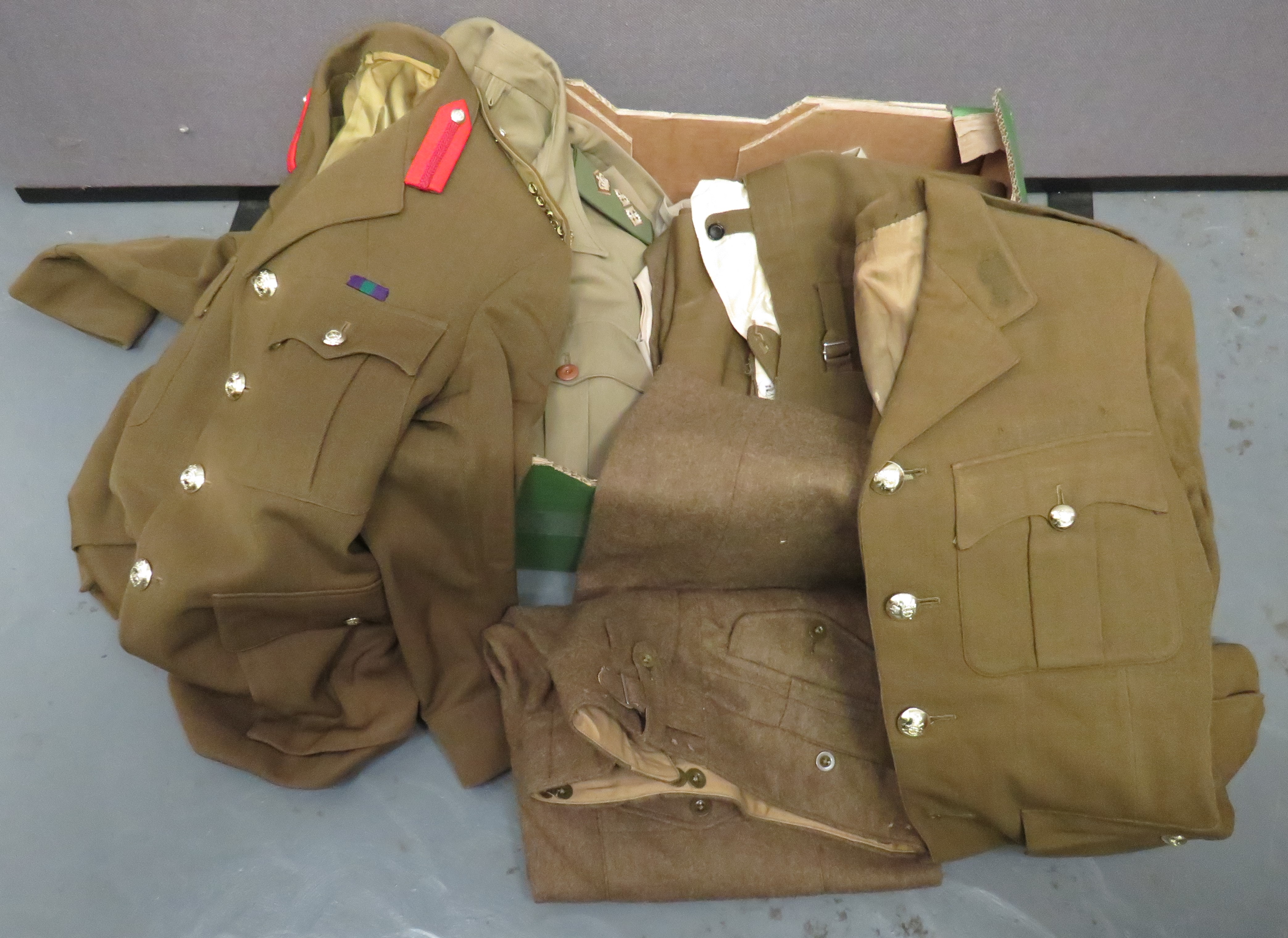 Selection Of Post War Military Uniforms including Royal Artillery Officer's service dress and