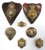 7 x Various Cavalry Horse Badge Mounts including cast brass 7th Dragoon Guards on leather breast