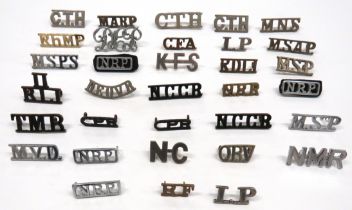 33 x Various Shoulder Titles white metal include CTH ... MSAP ... MARP ... MNS ... MSP ... DEOUR ...