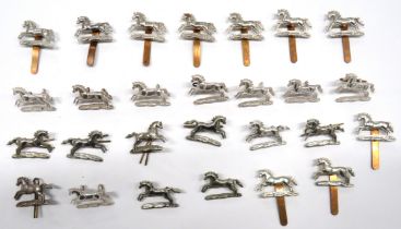 27 x Northamptonshire Yeomanry Cap Badges 10 x white metal horse on slider, all with maker