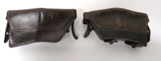 Facing Pair Of WW1 Austrian Issue M1888 Ammunition Pouches brown leather, rectangular pouches.
