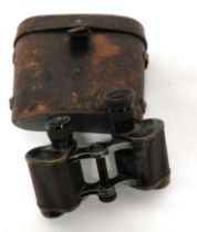 WW1 German/Austrian Binoculars By Zeiss blackened brass frame with central leather covered body.