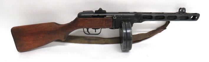 Deactivated Russian PPSH 41 Sub Machine Gun 7.62 mm, 10 1/2 inch barrel.  Outer shroud with oval