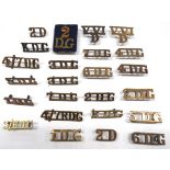 24 x Dragoon Guards Brass Shoulder Titles including KDG ... 1DG ... 2D ... 2DG (2 part) ... 2DG ..