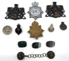 12 x Police Helmet And Cap Badges including blackened and brass City Of London helmet plate ...