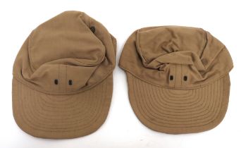 Two WW2 Dated British Combat Caps khaki cotton crown with side vents and front badge holes.  Large