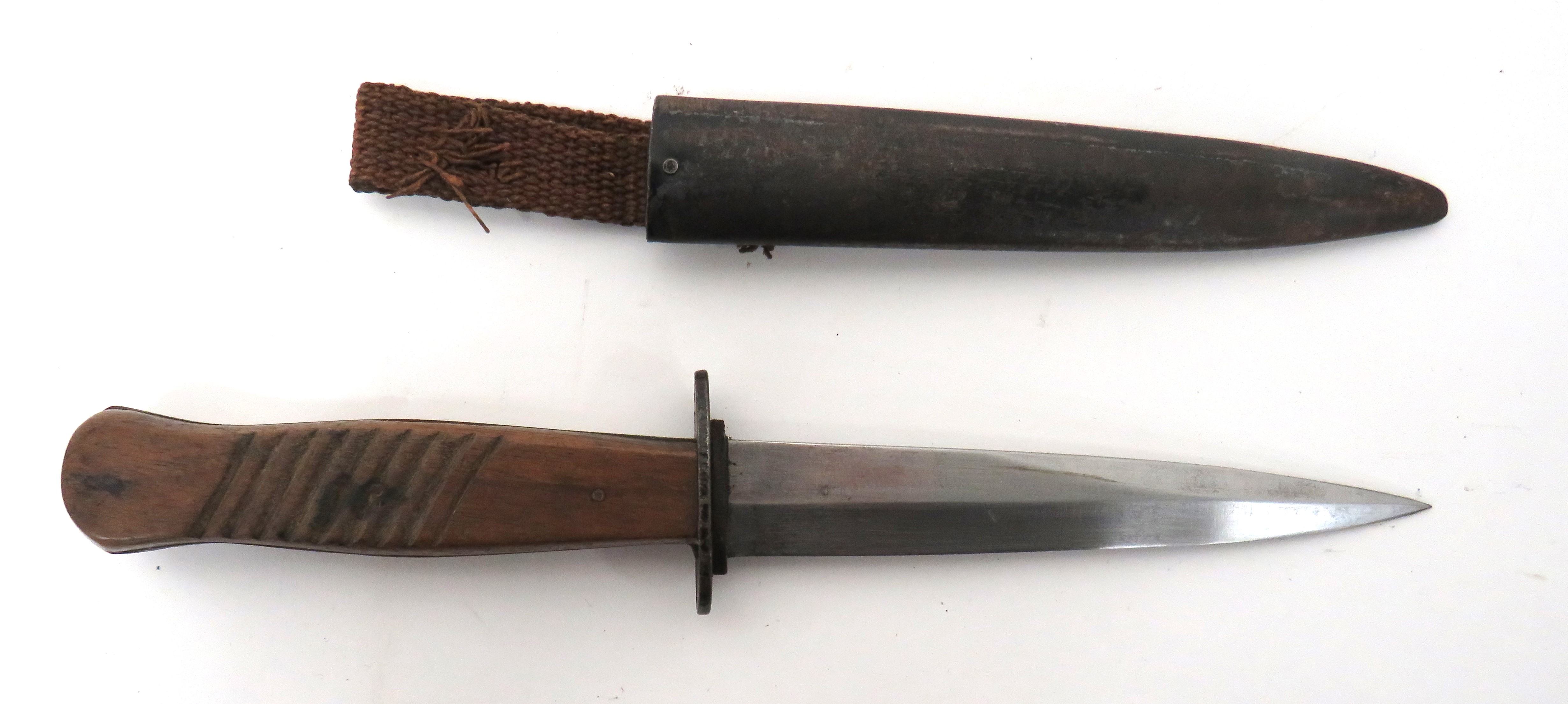 WW1 Imperial German Trench Knife 5 3/4 inch, single edged blade with back edge sharpened point.