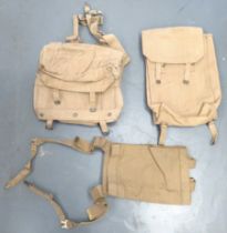 Three 1937 Pattern Webbing Equipment Carriers consisting khaki webbing, open top pack for cartridges