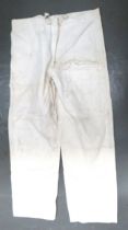 WW2 British Camouflaged Snowsuit Over Trousers white cotton over trousers.  Left leg with patch