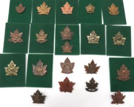 20 x Canadian WW1 Overseas Battalion Cap Badges darkened maple leaf example badges include KC 18