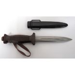 Post War Eastern Bloc Combat Knife 5 3/4 inch, double edged blade with narrow, central fuller.