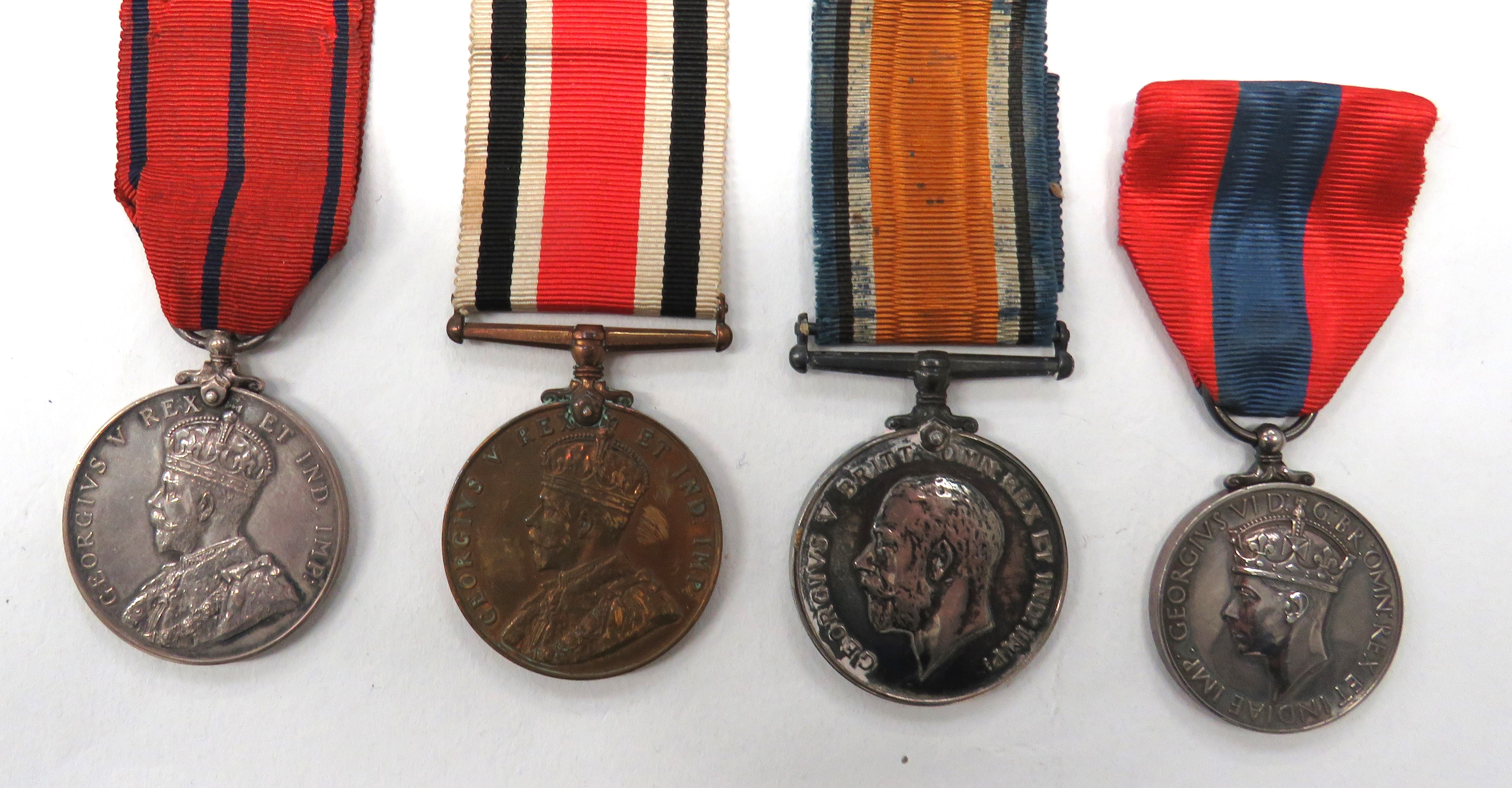 4 x Medals Including Police Examples consisting Metropolitan Police Coronation 1911 medal, named "