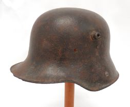 Imperial German M1916 Steel Helmet steel crown with lower, roll edge brim.  Large side studs.