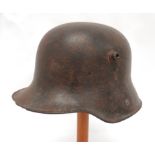 Imperial German M1916 Steel Helmet steel crown with lower, roll edge brim.  Large side studs.